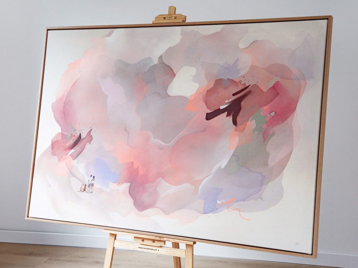 Wedding-Painting – Hochzeitsmalerei – Künstlerisches Gästebuch Braut in einem eleganten Kleid, die an einer Leinwand steht und malt.